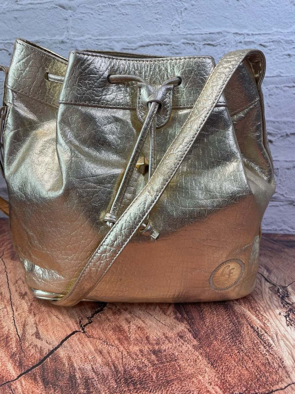 Carlos Falchi Metallic Gold Leather Drawstring Bucket Bag